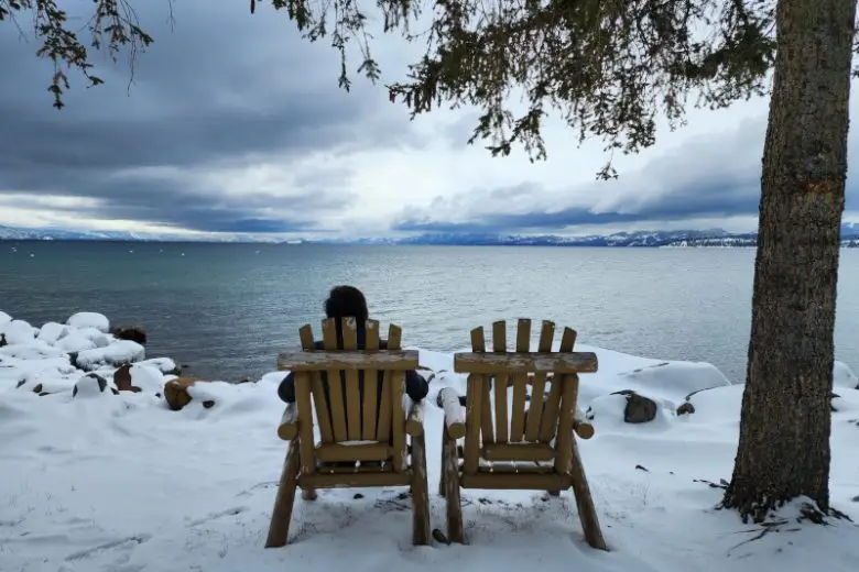 Person sitting watching Lake Tahoe weather conditions